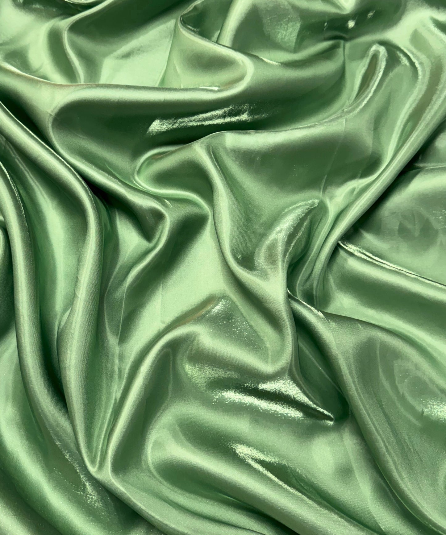 sage glossy fabric, sage reflective fabric, sage fabric for gowns, sage gown, sage liquid satin, sage silk fabric