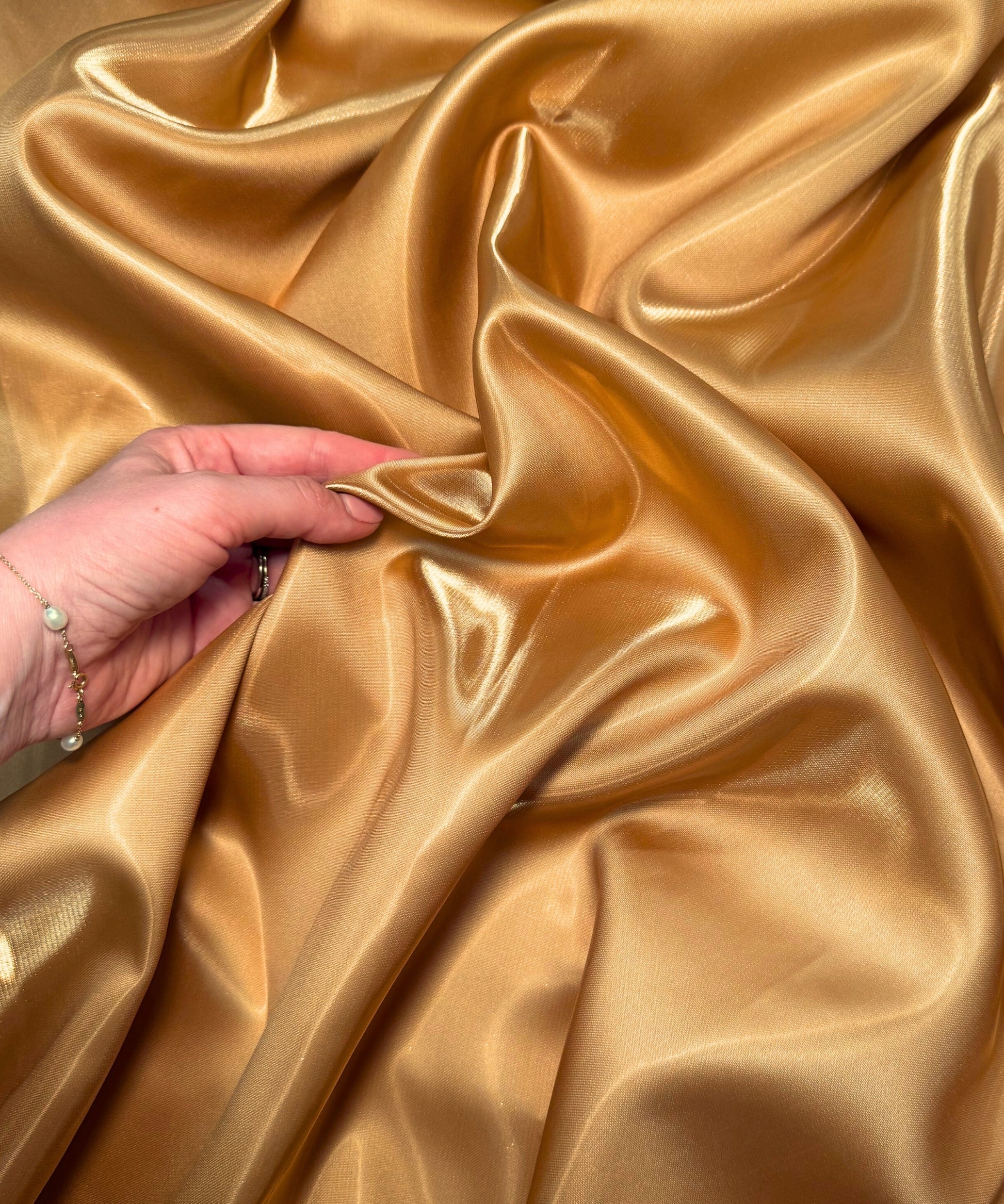 Italian Gold Liquid Bridal Satin Ultra Glossy Designer Fabric Sew The Trend Italian Gold Liquid Bridal Satin Ultra Glossy Designer Fabric Sew The Trend