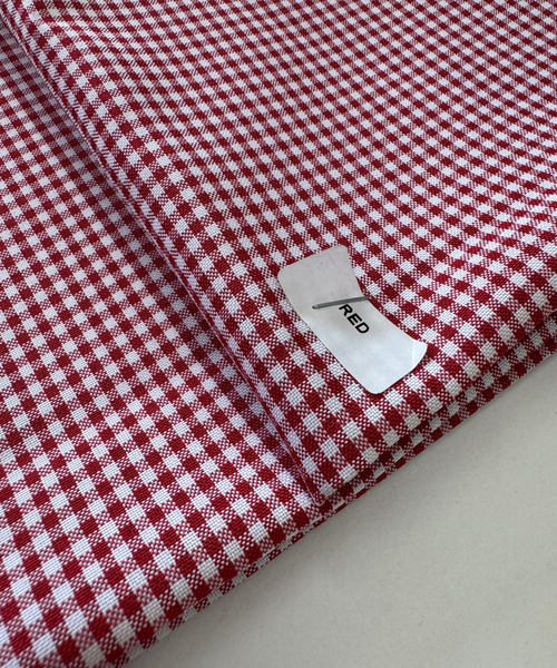 Red and white checkered fabric. Red gingham fabric. 