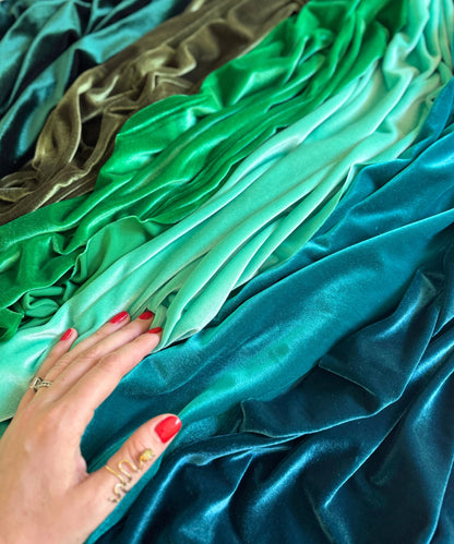Whether you're creating apparel or sophisticated interiors, our stretch velvet fabric brings you designer-level results—without the designer price. This luxurious stretch velvet is soft, durable, and incredibly comfortable. Crafted with exceptional resilience and flexibility, it’s ideal for a wide range of apparel and decorative projects.

Woven with a 90% polyester, 10% spandex fiber blend and a premium 360 GSM, this stretch velvet delivers exceptional durability, fluid drape, and a 4-way stretch—making it